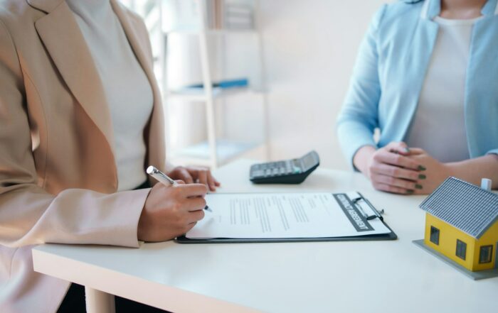 Customer discussing for the contract to buy home and insurance or loan real estate or property. - Loan Financing Customer discussing for the contract to buy home and insurance or loan real estate or property.