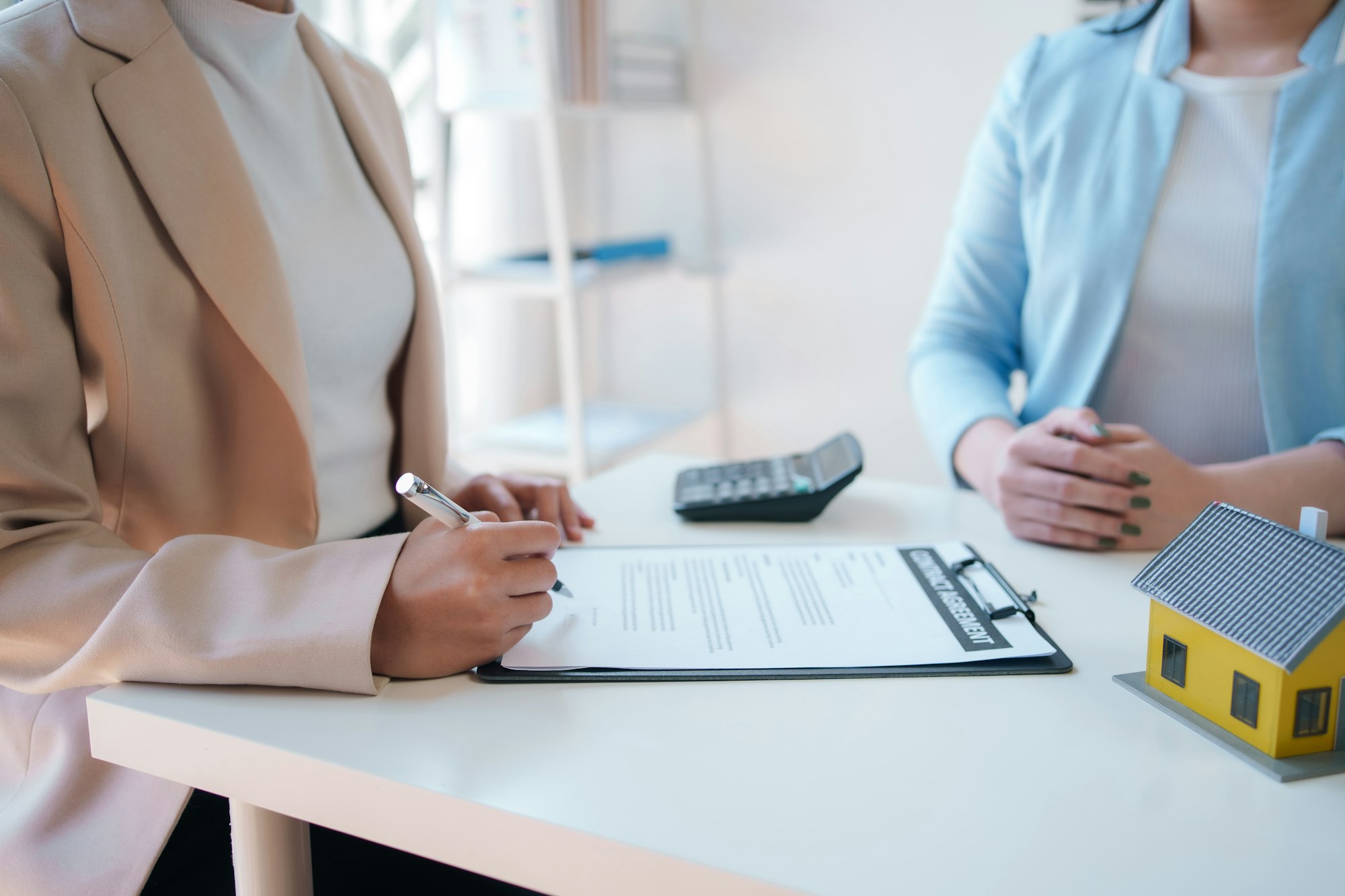 Customer discussing for the contract to buy home and insurance or loan real estate or property.